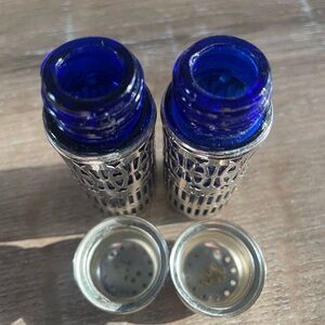 Blue Glass salt and pepper shakers with Silver plated Design
